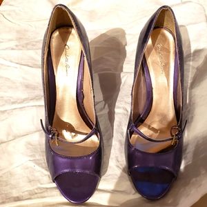 Plum purple high heeled dress shoes